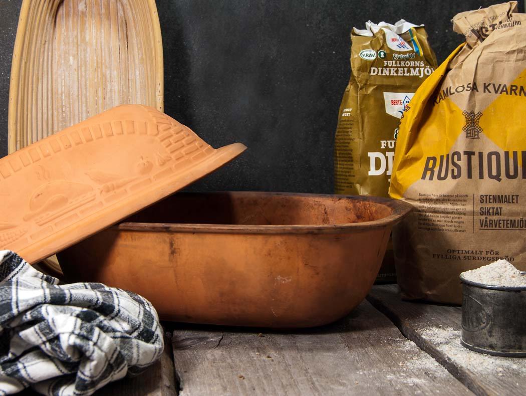 Baking sourdough bread in clay baker - Sourdough&Olives